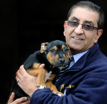 Council dog warden Terry Singh with a stray pooch - 269993